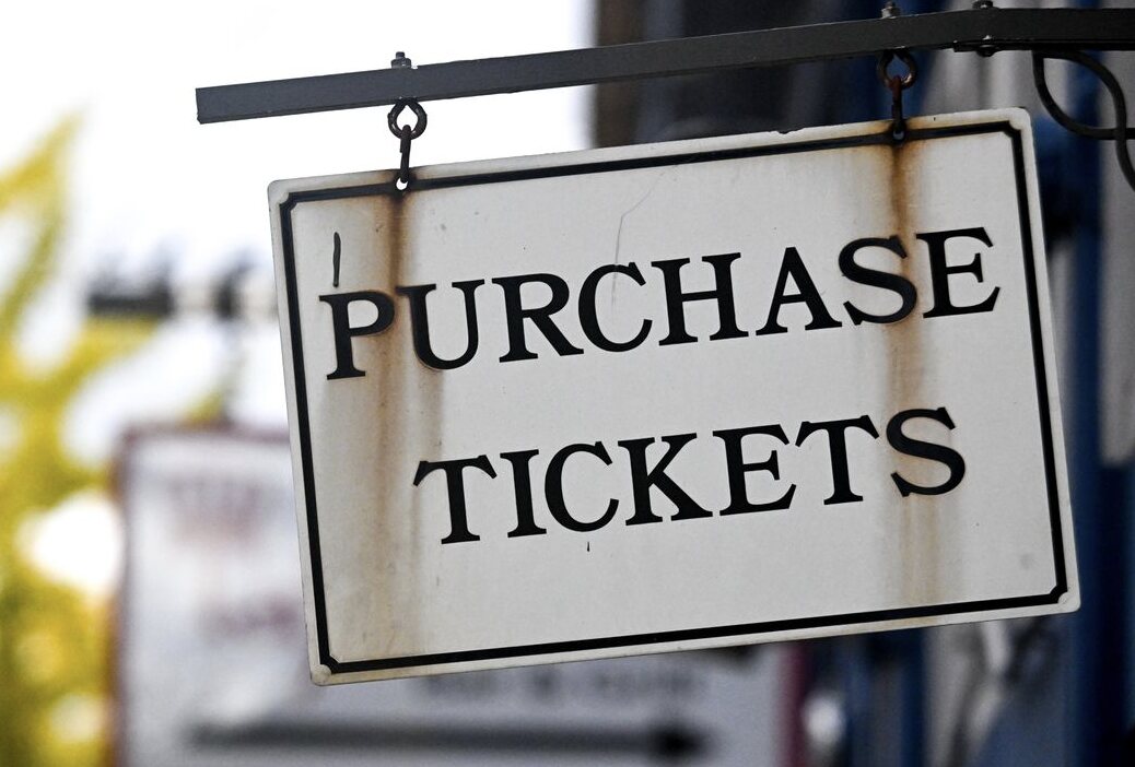 Vintage purchase tickets sign